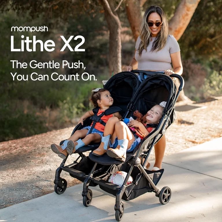 Mom pushing two children in a lightweight double stroller through an Orlando park